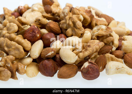 mixed nuts  -  hazelnuts, walnuts, cashews,  pine nuts Stock Photo