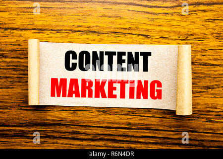 Hand writing text caption inspiration showing Content Marketing. Business concept for Online Media Plan written on sticky note paper on the wooden background. Stock Photo