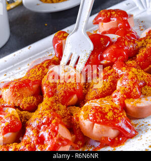 curry bockwurst with beer Stock Photo