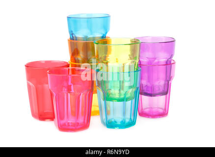 Colorful plastic glasses isolated on white background. Stock Photo