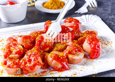 curry bockwurst with beer Stock Photo