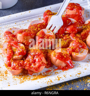 curry bockwurst with beer Stock Photo