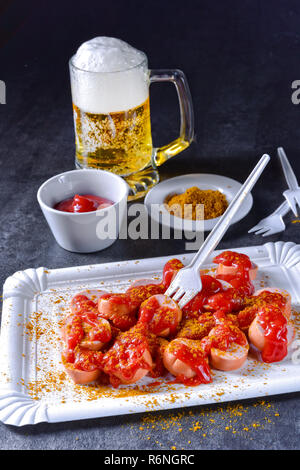 curry bockwurst with beer Stock Photo