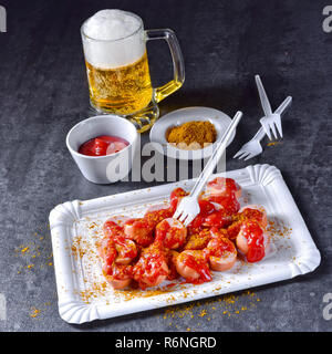 curry bockwurst with beer Stock Photo