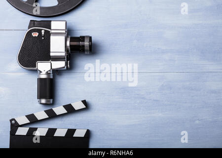 Movie Camera With Film Reel And Clapper Board Stock Photo