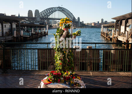 06.05.2018, Sydney, New South Wales, Australia - A street performer is disguised as a human statue and performs at Circular Quay. Stock Photo