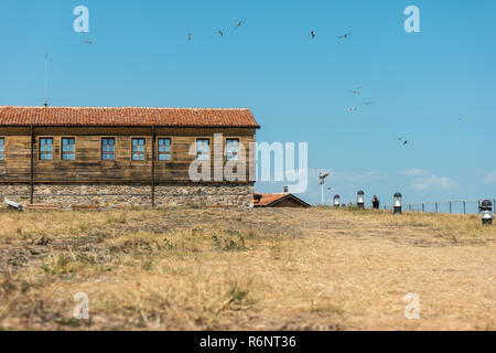 Buildings (formerly owned by the Bulgarian Orthodox Church) on St. Anastasia Island in the Burgas Bay of the Black Sea. Bulgaria. Stock Photo