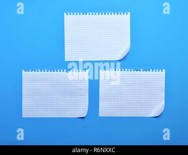 three blank sheet of paper with curved corners Stock Photo