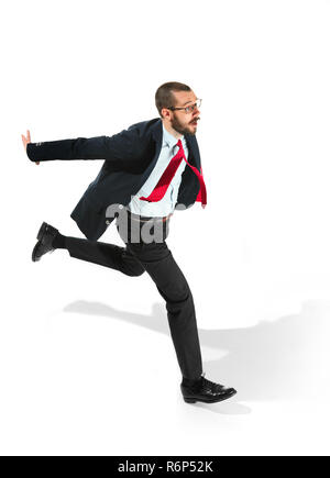 Businessman running with a folder on white background Stock Photo