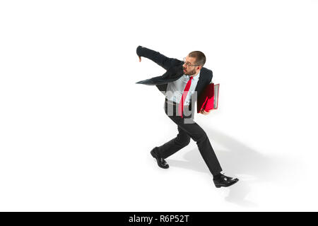Businessman running with a folder on white background Stock Photo