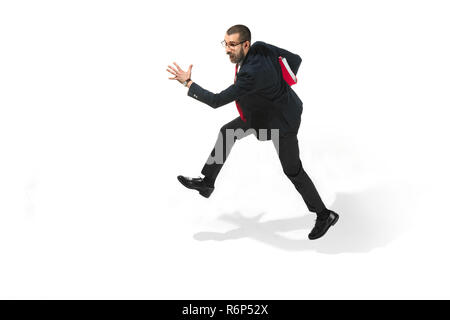 Businessman running with a folder on white background Stock Photo