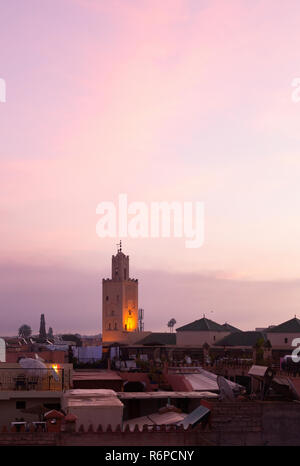 Marrakech sunrise over rooftops and a mosque, Marrakesh, Morocco North Africa Stock Photo