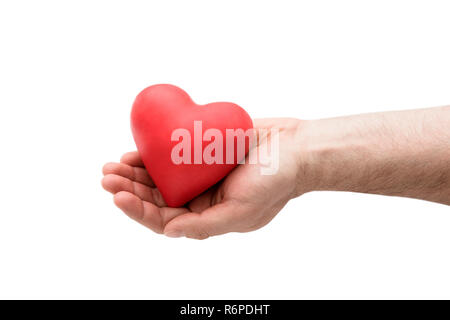 Red heart in man's hand Stock Photo