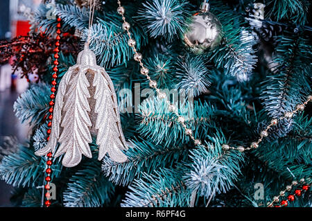Beautiful Christmas decorations hanging on a Christmas tree. Home decoration for Christmas Stock Photo