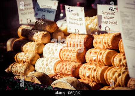 traditional polish smoked cheese oscypek on outdoor market in zakopane Stock Photo