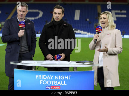 Sky Sports pundits Jamie Carragher (left) and Gary Neville with presenter Kelly Cates Stock Photo