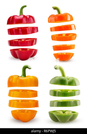 Set slices orange, red, green, yellow bell pepper flying in the air isolated on white background. Clipping Path. Stock Photo