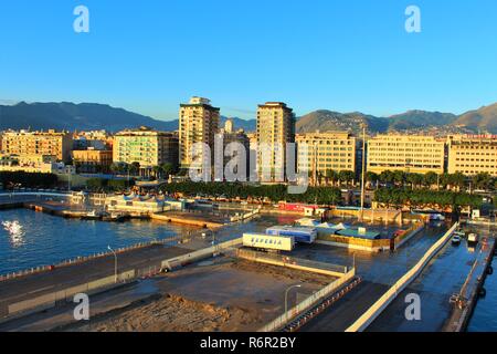 Palermo, Sicily, Italy - October 22nd 2018: Early morning view of the mountainous skyline, old town and port from the top of a docked Cruise Ship. Stock Photo