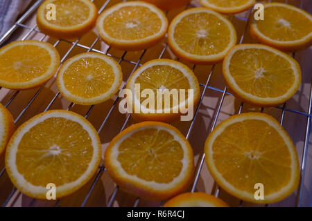 sliced oranges, ready to be dried Stock Photo