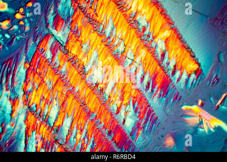 urea in polarized light,crystals enlarged 100x Stock Photo