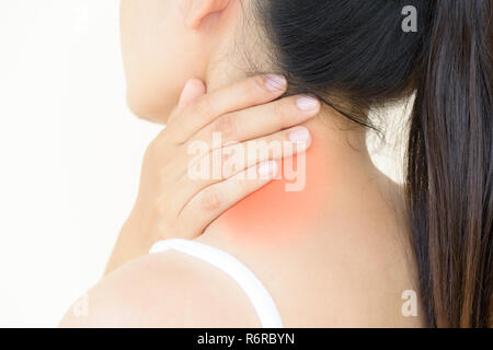 Closeup woman neck and shoulder pain and injury. Health care and medical concept. Stock Photo