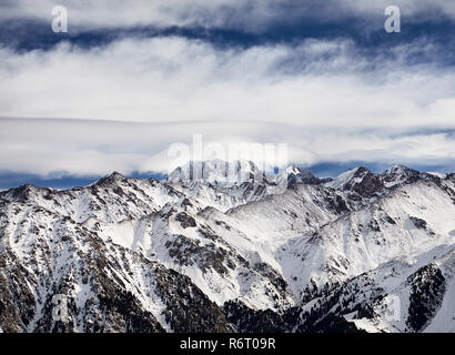 High mountains with snow and peak Talgar in Northern Tien Shan, Kazakhstan Stock Photo