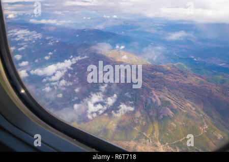 Cloudy mountain view from airplane window, Macedonia. Stock Photo