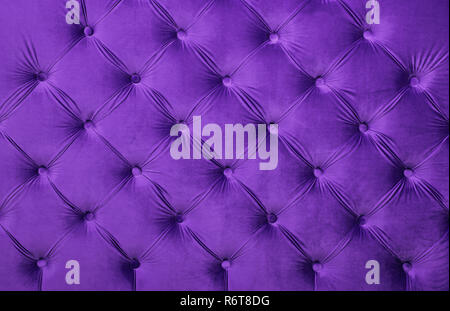 Violet capitone tufted fabric upholstery texture Stock Photo