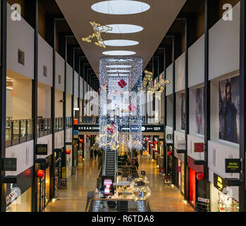 Ocean Terminal, Leith, Edinburgh, Scotland, United Kingdom, 6th December 2018. The shopping centre is lit up with Christmas decorations, but few shoppers are evident on a weekday in early December Stock Photo