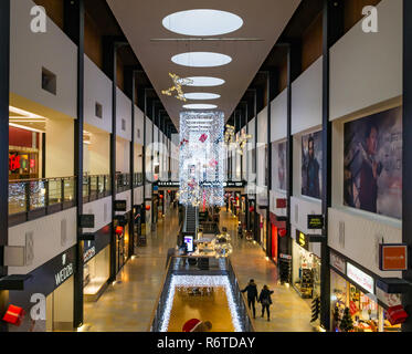 Ocean Terminal, Leith, Edinburgh, Scotland, United Kingdom, 6th December 2018. The shopping centre is lit up with Christmas decorations, but few shoppers are evident on a weekday in early December Stock Photo