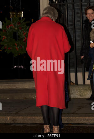 London,UK,6th December 2018,Rear of The Prime Minister, Theresa May, after switching on the Downing St Christmas Lights as she chatted to Members of the Military Wives Choirs who also performed Christmas carols. Credit: Keith Larby/Alamy Live News Stock Photo