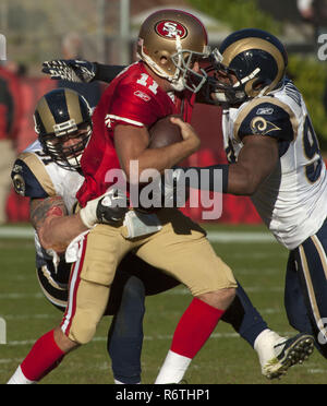 San Francisco, California, USA. 4th Dec, 2011. St. Louis Rams defensive end Chris Long (91) and defensive end Robert Quinn (94) sack San Francisco 49ers quarterback Alex Smith (11) on Sunday, December 4, 2011 at Candlestick Park, San Francisco, California. The 49ers defeated the Rams 26-0. Credit: Al Golub/ZUMA Wire/Alamy Live News Stock Photo