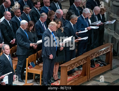 Current and former United States Presidents in attendance at the National funeral service in honor of the late former US President George H.W. Bush at the Washington National Cathedral in Washington, DC on Wednesday, December 5, 2018. Front row, from left to right: former US President George W. Bush, US President Donald J. Trump, first lady Melania Trump, former US President Barack Obama, former US President Bill Clinton, former US Secretary of State Hillary Rodham Clinton, former US President Jimmy Carter, former first lady Rosalynn Carter. Second row: US Vice President Mike Pence, Karen Pe Stock Photo