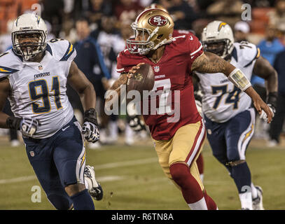 San Francisco, California, USA. 30th Aug, 2012. San Diego Chargers defensive end Kendall Reyes (91) flushes San Francisco 49ers quarterback Colin Kaepernick (7) out of the pocket on Thursday, August 30, 2012 in San Francisco, California. 49ers defeated the Chargers 35-3 in a preseason game. Credit: Al Golub/ZUMA Wire/Alamy Live News Stock Photo