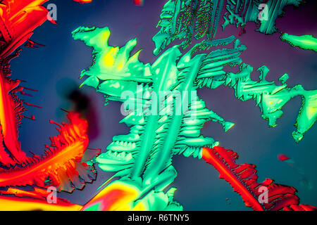 urea in polarized light,crystals enlarged 100x Stock Photo