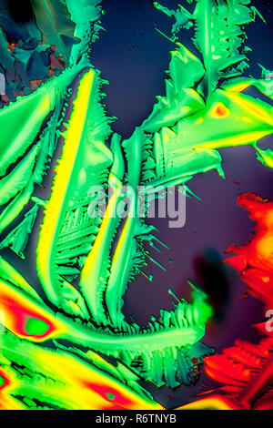 urea in polarized light,crystals enlarged 100x Stock Photo