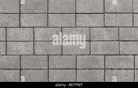 Facing gray tiles background Stock Photo