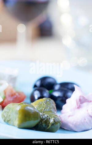 greek taramas and stuffed grape leaves with salad