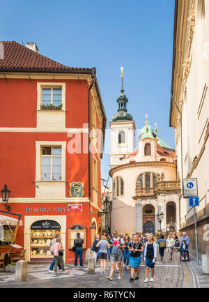 Prague tourists on Karlova street near Chapel of the Assumption of the Virgin Mary at Clementinum Prague Karlova Liliova Prague Czech Republic Europe Stock Photo