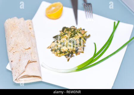 Spinach, The legend of the high iron content Stock Photo