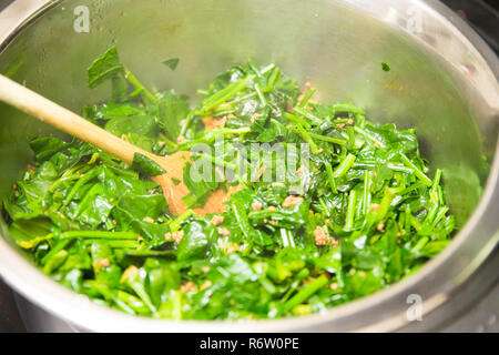 Spinach, The legend of the high iron content Stock Photo