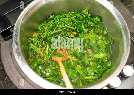 Spinach, The legend of the high iron content Stock Photo