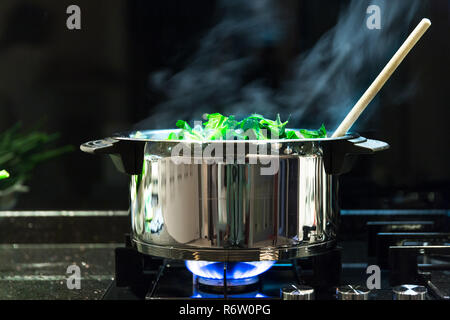 Spinach, The legend of the high iron content Stock Photo