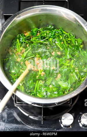 Spinach, The legend of the high iron content Stock Photo