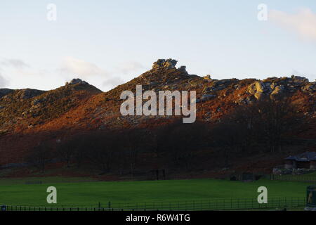 Valley of the Rocks Ridge Line by Lynton & Lynmouth Cricket Club, in the Golden Light of a Winter Sunset. Exmoor National Park, North Devon, UK. Stock Photo