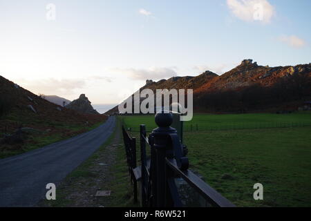 Valley of the Rocks Ridge Line by Lynton & Lynmouth Cricket Club, in the Golden Light of a Winter Sunset. Exmoor National Park, North Devon, UK. Stock Photo