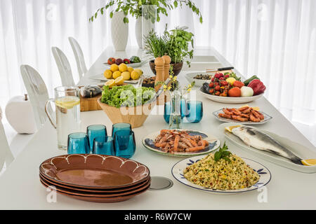 Mediterrannean lunch on kitchen island in new build villa, Quinta do Lago Stock Photo