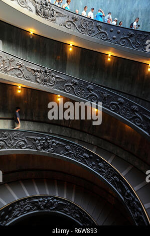 Vertical perspective of Bramante spiral staircase, a double helix staircase designed by Giuseppe Momo in 1932, a modern take on the original staircase