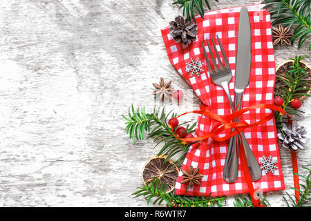 Christmas table place setting with festive decorations. Holidays background. top view with copy space Stock Photo