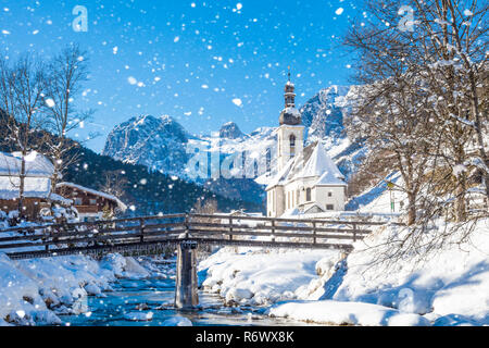 Snowfall in Ramsau, the parish church Saint Sebastian in winter, Ramsau, Berchtesgaden, Bavaria, Germany Stock Photo